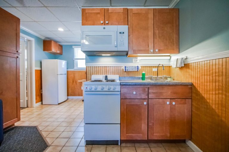 Kitchen with stove and cabinets