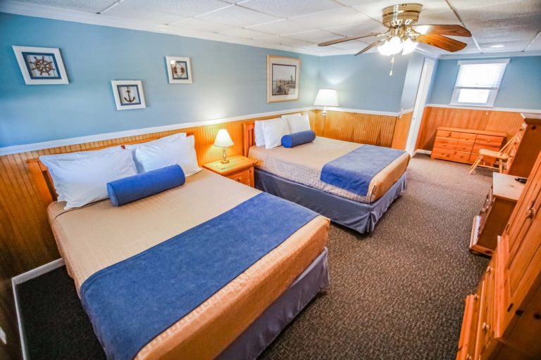 Photo of bedroom with two queen size beds